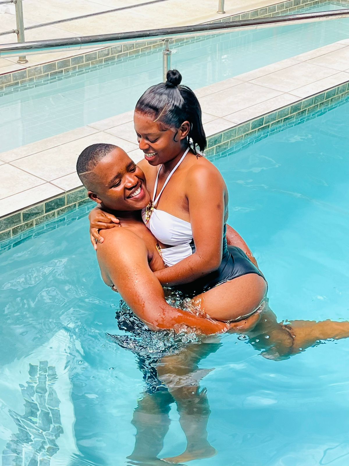 Couple relaxing together in the hydro pool.